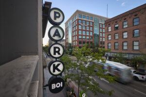 Signage on parking garage reads PARKBOI